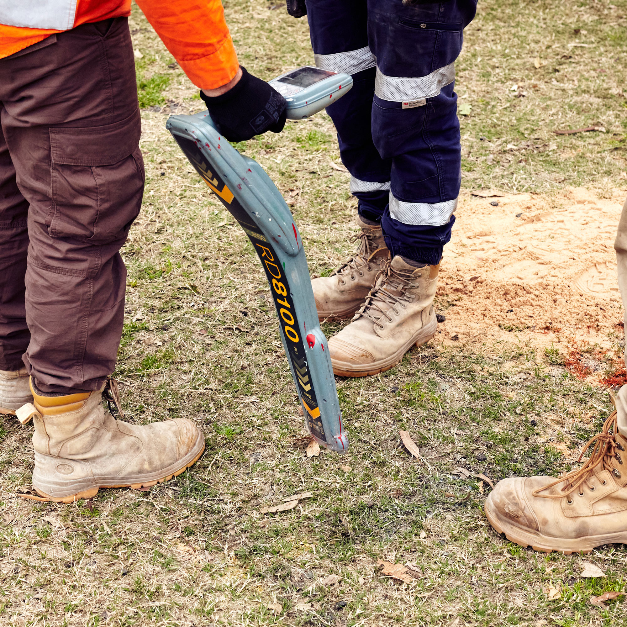 Underground service exposed by non-destructive vacuum excavation